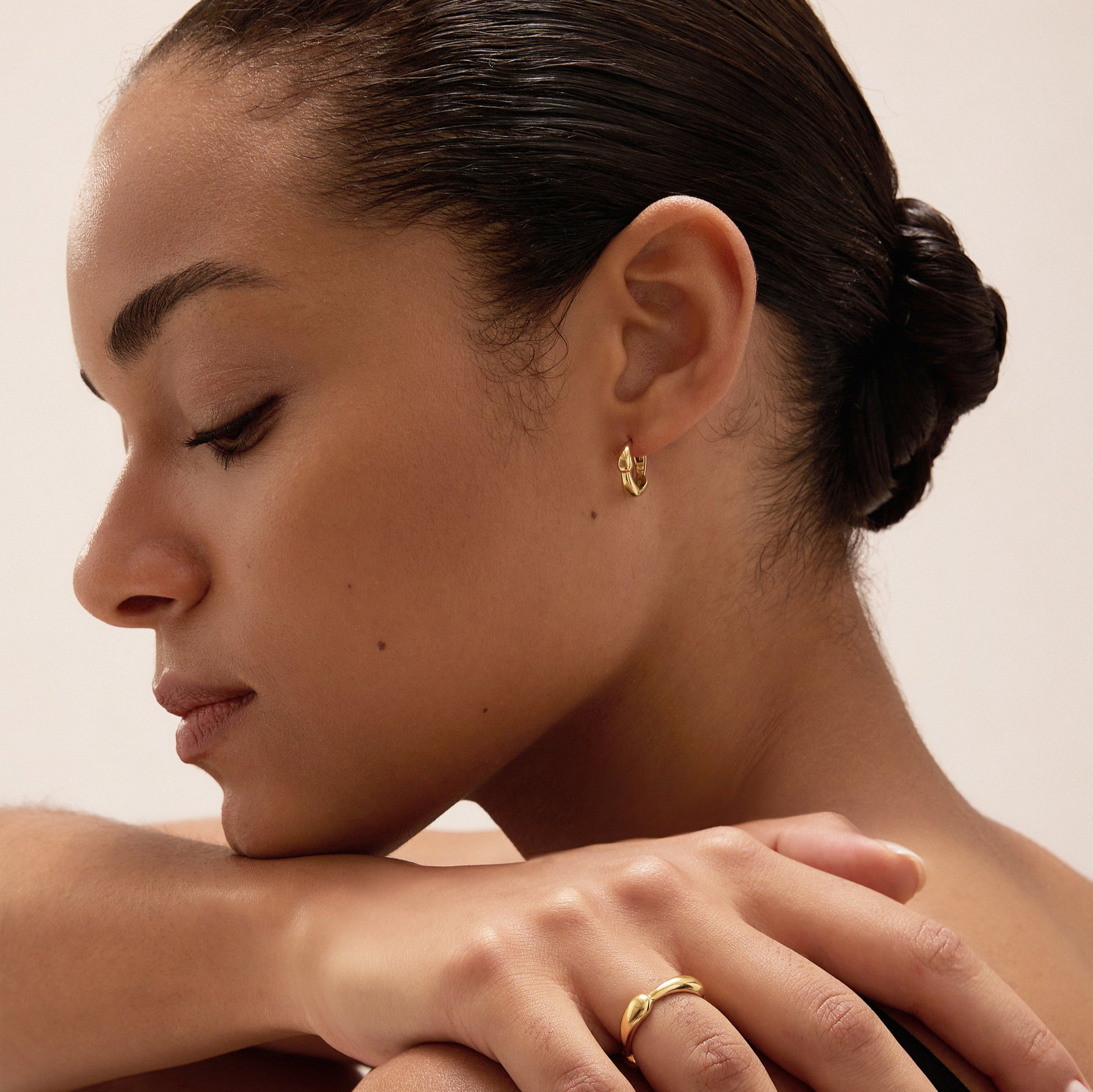 Gold stacking ring with gold huggies