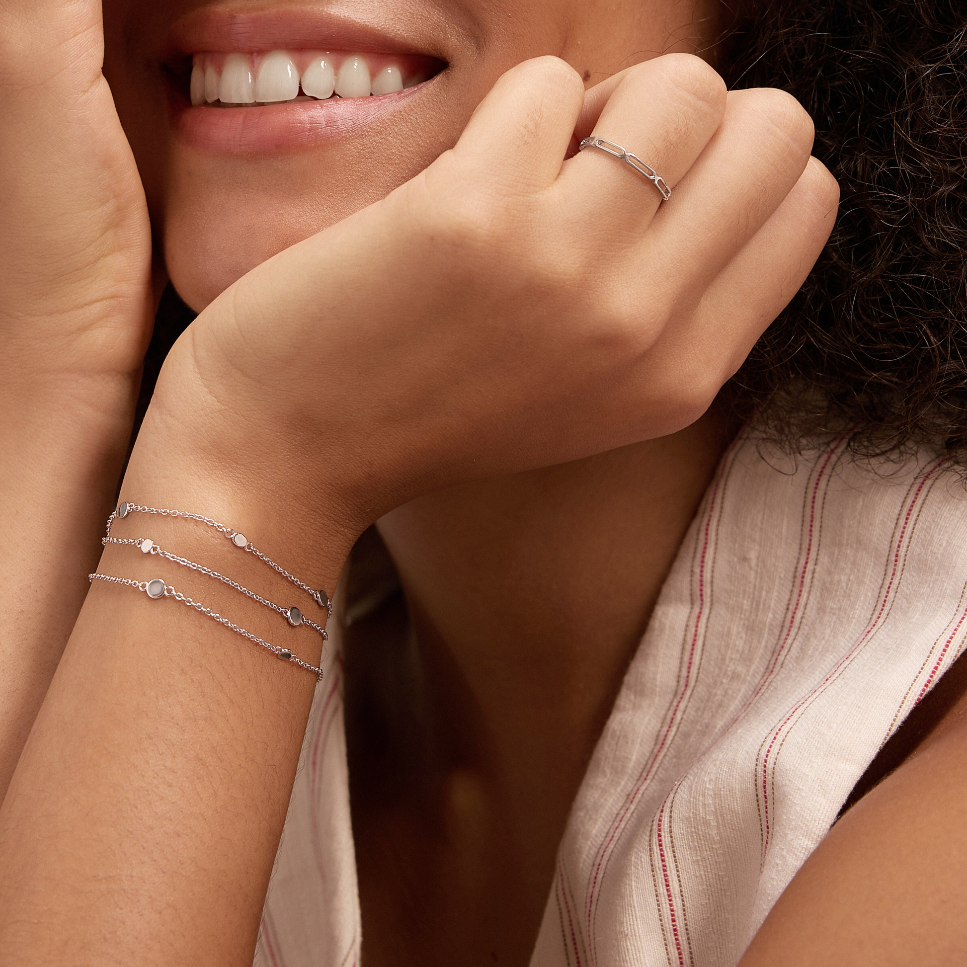dainty silver triple bracelet with silver paperclip ring