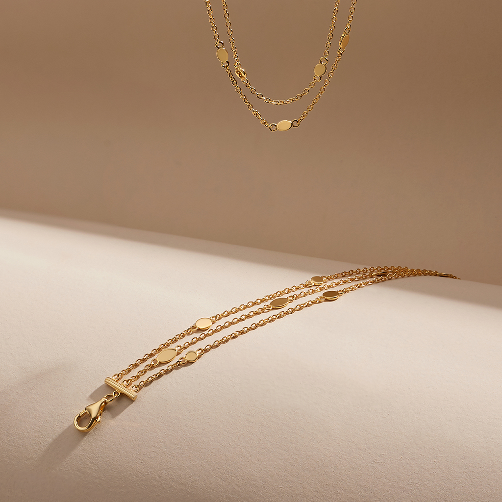 dainty layered gold chain and necklace