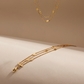 dainty layered gold chain and necklace